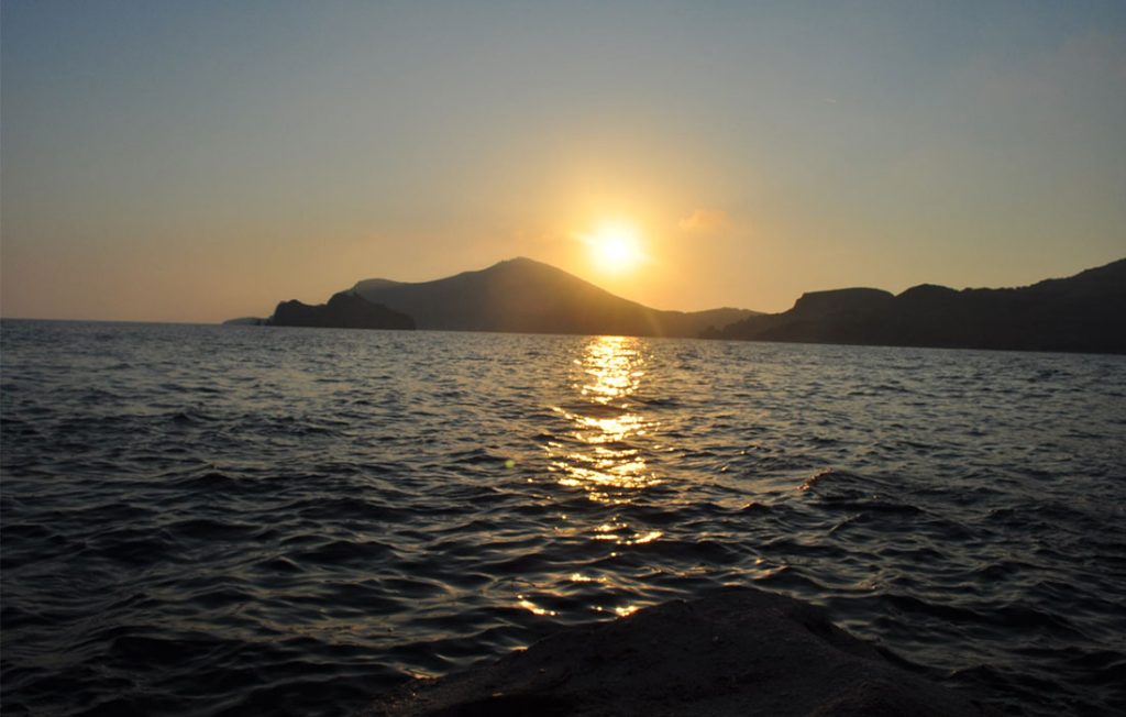 sunset over lemnos island greece - travel nostalgia